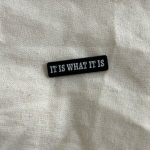 Black and White 'It Is What It Is' Enamel Pin